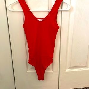 Ribbed body suit w/ side cutouts